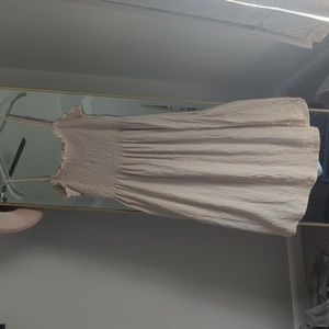 Ruched top maxi tank dress with adjustable straps.